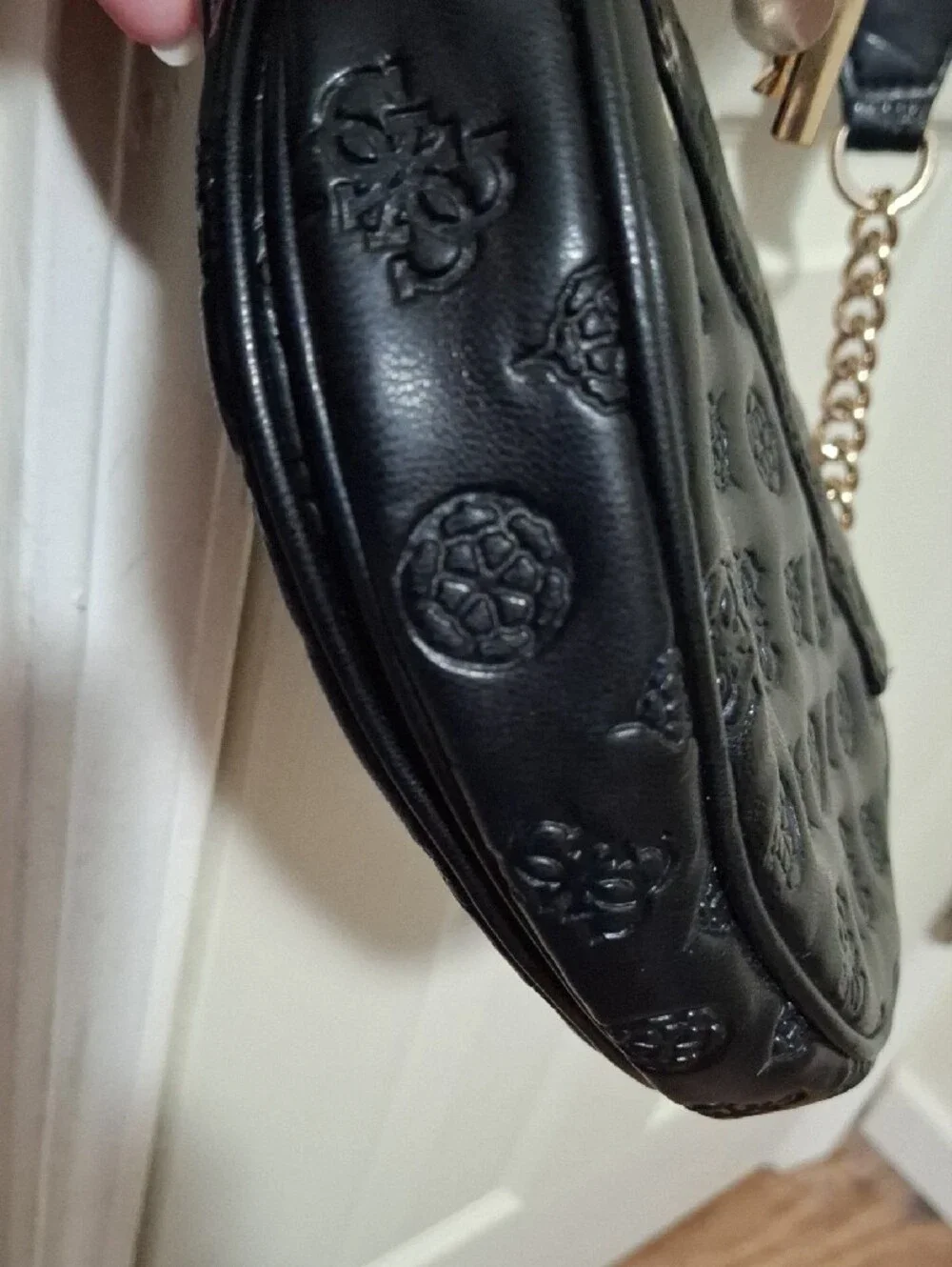 GUESS Black Embossed Leather Shoulder Bag with Gold Chain and Charm Accent